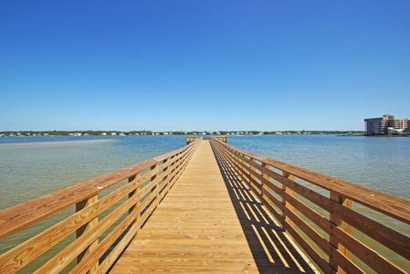 Just outside the home is a brand new community pier