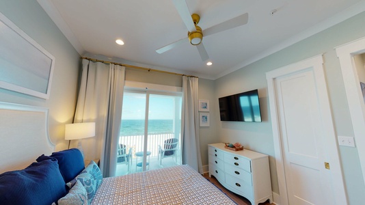 Bedroom #2 has a tv, balcony access, gulf views and a private bathroom