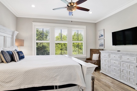 The primary bedroom offers a King bed and TV