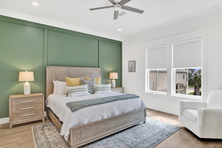 The 1st floor *main* primary bedroom offers a King bed and private bathroom