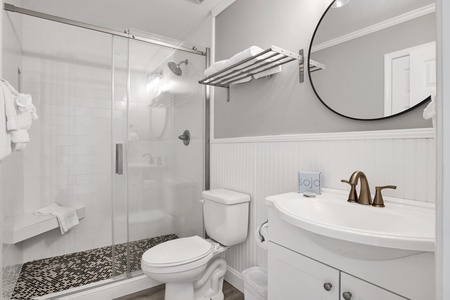Full size bathroom with a walk-in shower