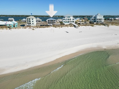 Huge beach area in front of the home