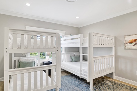 Bedroom 4 offers 1 Twin bunk bed and 1 Full bunk bed, sleeping 6 along with a private bathroom