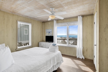 Bedroom 2 comes with a queen bed and Gulf views
