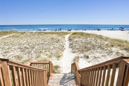 Steps to the white sand and blue Gulf water