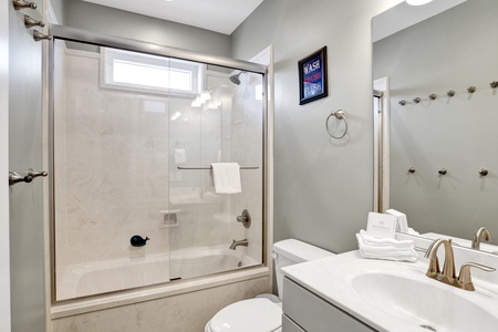 Bedroom 7 and 8 share the hall bathroom that features a tub/shower combo