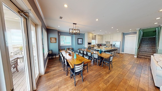 Large dining room that can seat 24 and  overlooks the the pool and the Gulf