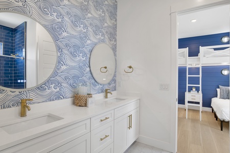 The private bathroom has double vanities