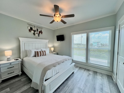 Bedroom 3 has a TV and Queen bed, sleeps 2