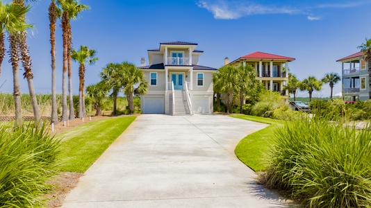 The private drive offers parking for 2 vehicles in the garage and 4 cars MAX in the driveway