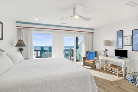 Bedroom 2 has Gulf views, TV, a private balcony and a private bathroom