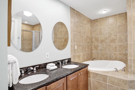 The private bathroom has double vanities