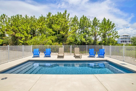 Fenced heated pool (additional fees apply) with room to lounge