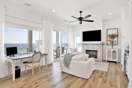 The Master suite has a desk and it's own living area complete with a mounted TV