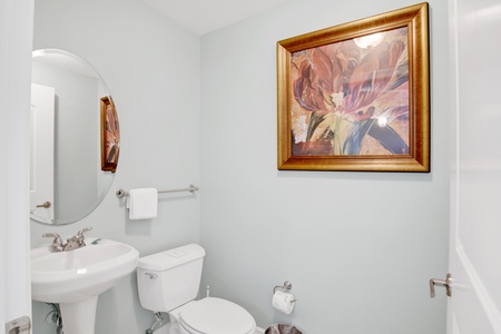 A half bathroom located in the hallway