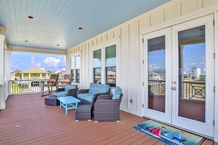Enjoy the covered porch with views of the Gulf