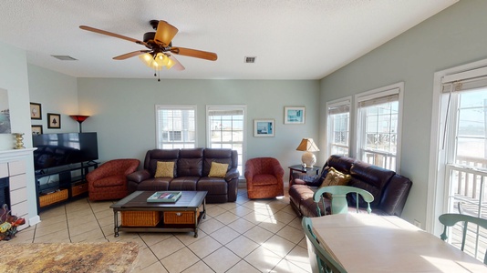 Open concept living and a large LCD TV