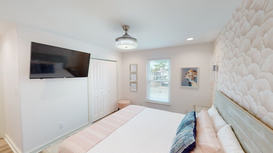 The Master bedroom comes with a television and a private bathroom