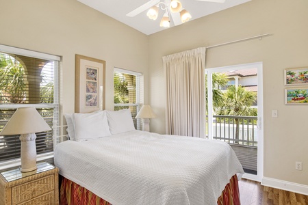 Bedroom 4 offers a private bathroom, balcony access, TV and Queen bed, sleeps 2