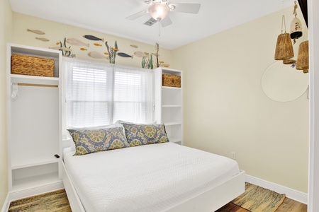 Guest bedroom 1 offers a King bed and TV, sleeps 2