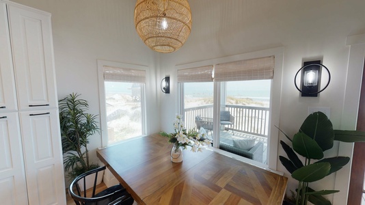 Dining room table with windows all around