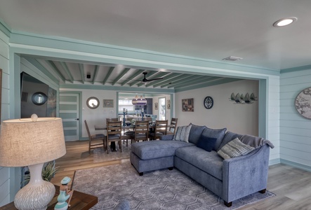 The living room offers a sleeper sofa