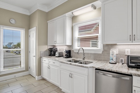 Offering granite counters and stainless appliances