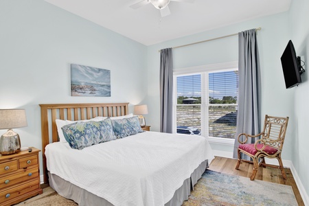 Guest bedroom 4 is located on the 1st floor and offers a King bed