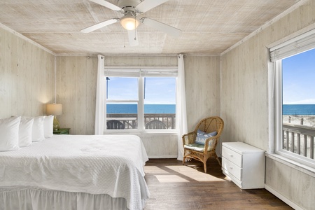 The master bedroom has a queen bed and amazing Gulf views
