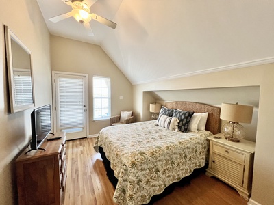 Guest Bedroom 4 has a queen bed, TV and balcony access