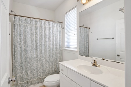 Private bathroom in Bedroom 4 with a tub/shower combo