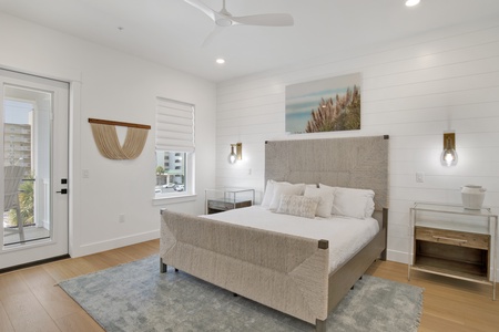 The master bedroom has a private bathroom and balcony access with Gulf views