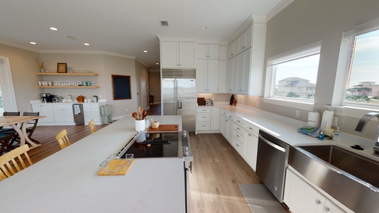 Beautiful open kitchen with windows all around on the top floor