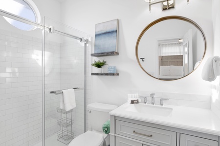 The private master bath has a walk-in shower