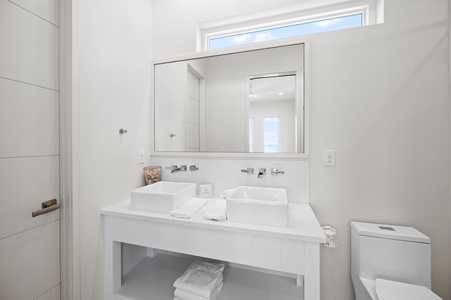 There is also a double vanity in the bathroom in Bedroom 6