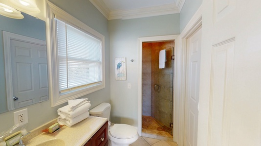 Private bath for bedroom 1 with a walk-in shower- West