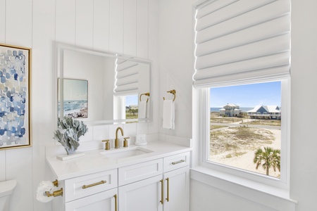 The private bathroom has a single vanity