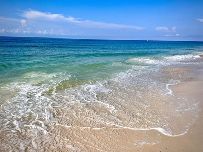 Hello Sunshine sits directly across the street from the Gulf!