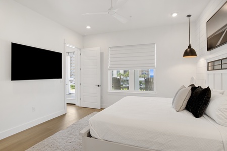 Guest bedroom 1 offers a TV and King bed, sleeps 2