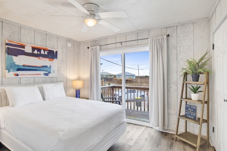 Guest bedroom 2 has a private balcony and shared bathroom