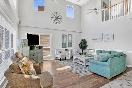 Vaulted ceiling, ceiling fans and large television