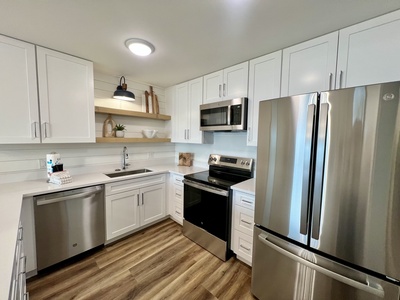 Fully equipped kitchen with stainless appliances