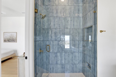 Featuring a walk-in tile shower