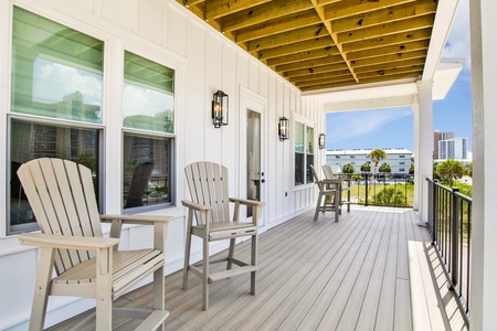 Balcony access with Gulf views on the main floor, between Guest bedrooms 1 and 2