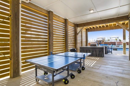 Ping-pong table and corn hole fun!