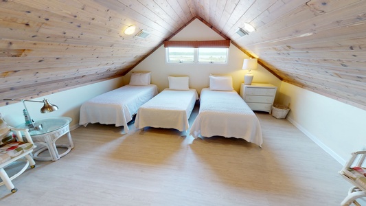 Upstairs loft with 3 twin beds