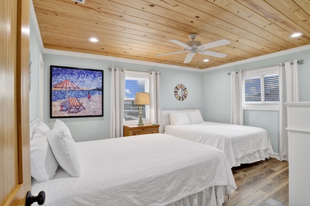 Guest bedroom 2 has a TV and private bathroom