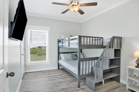 Bedroom 4 offers a Full over Full Bunk bed and TV