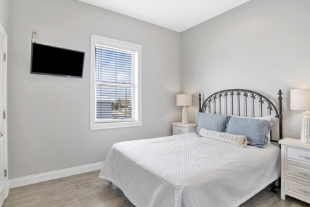 2nd floor Bedroom 2 has a queen bed and a TV