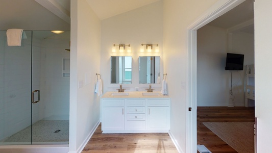 Private master bath in side B with a double vanity